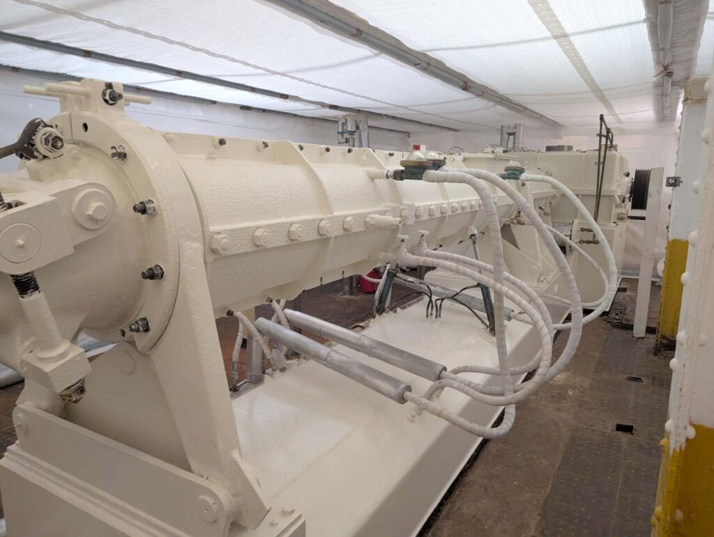 Buss mixer refurbishment with insulation coating applied to barrel section